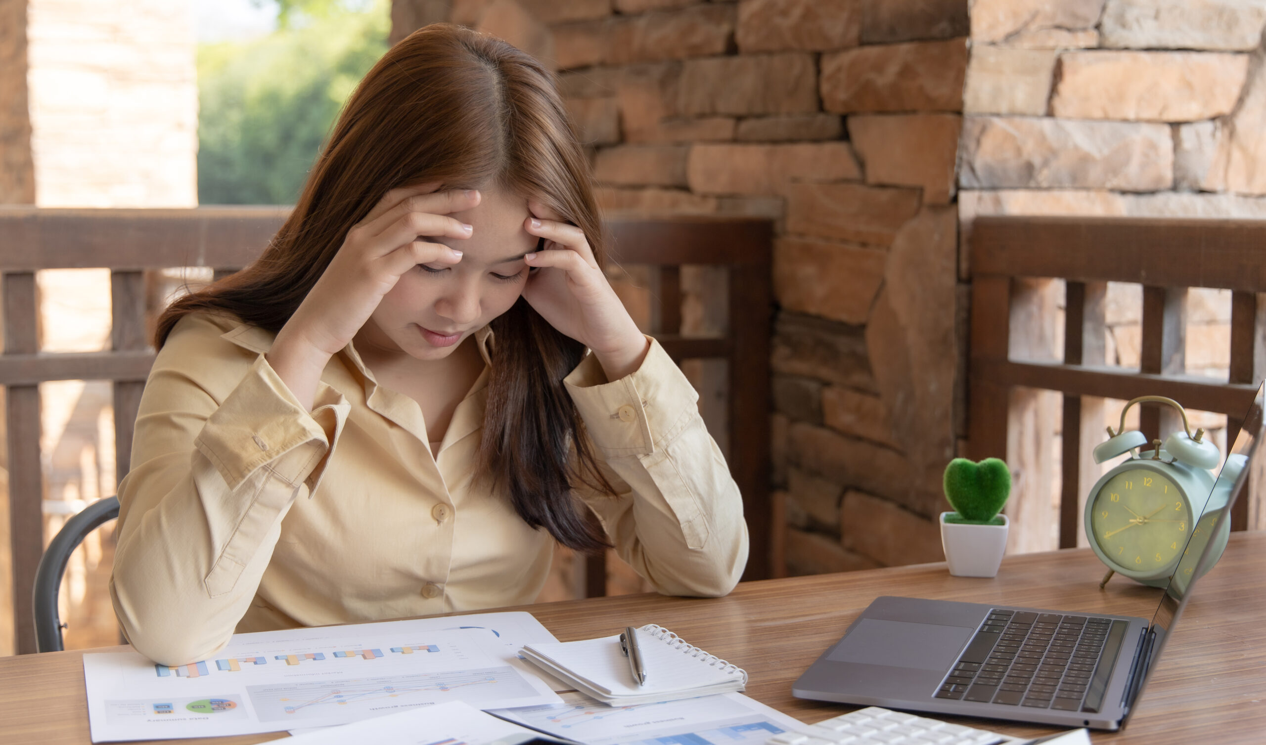 Asian female staffers are disappointed by the mistakes made, Despair or disappointment, Disappointed, very sad, and frustrated, feeling hopeless at work, Failure of life concept.